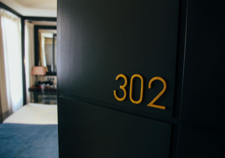 Stylish hotel room with room number 302 and elegant interior design